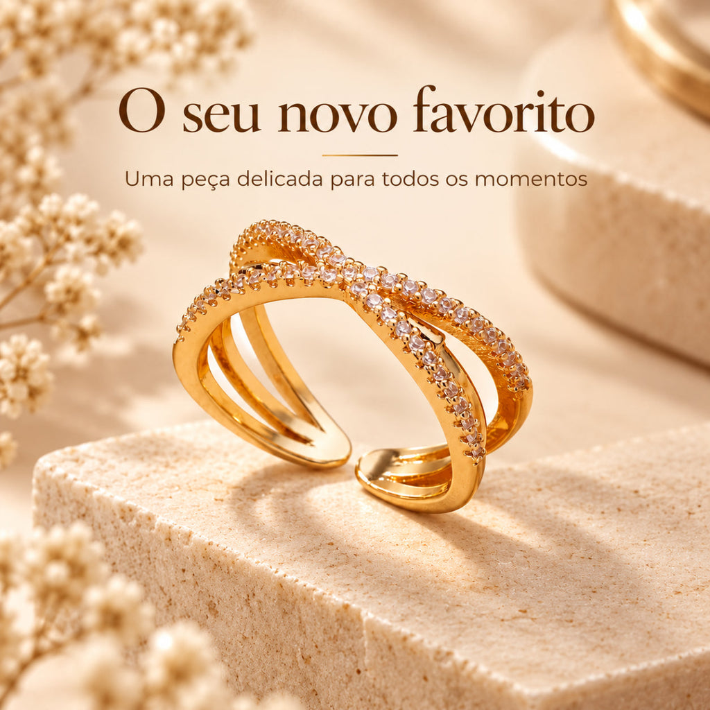 Anel GRACE com acabamento dourado e design cruzado para diferentes ocasiões