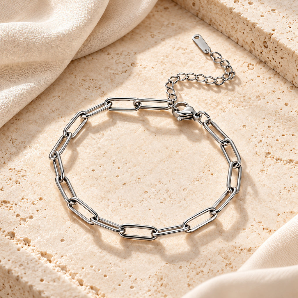 Pulseira ELOS em aço inoxidável apresentada em composição elegante.