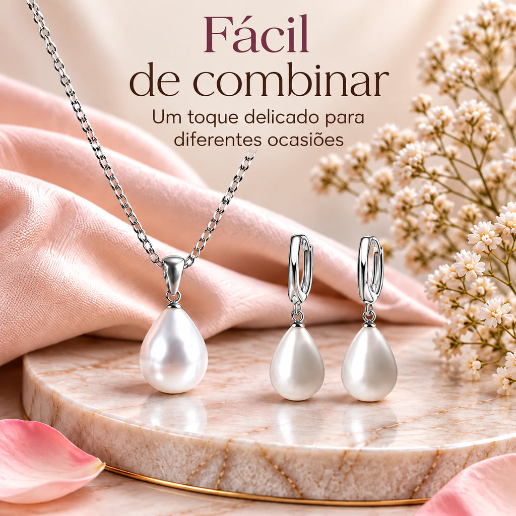 Conjunto ALVA com colar e brincos em acabamento prateado sobre fundo floral