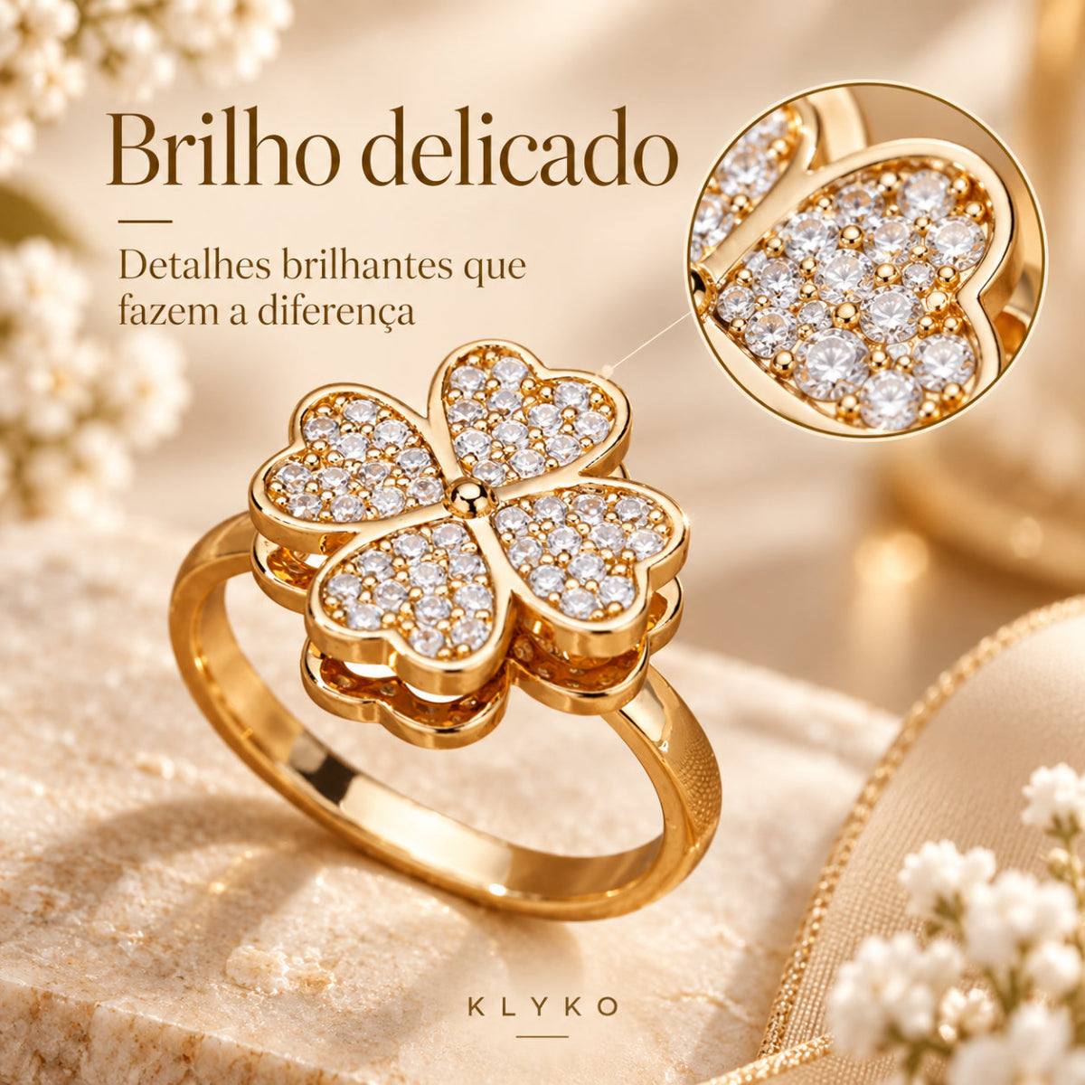 Close-up do Anel HOPE com pequenos detalhes brilhantes e acabamento dourado
