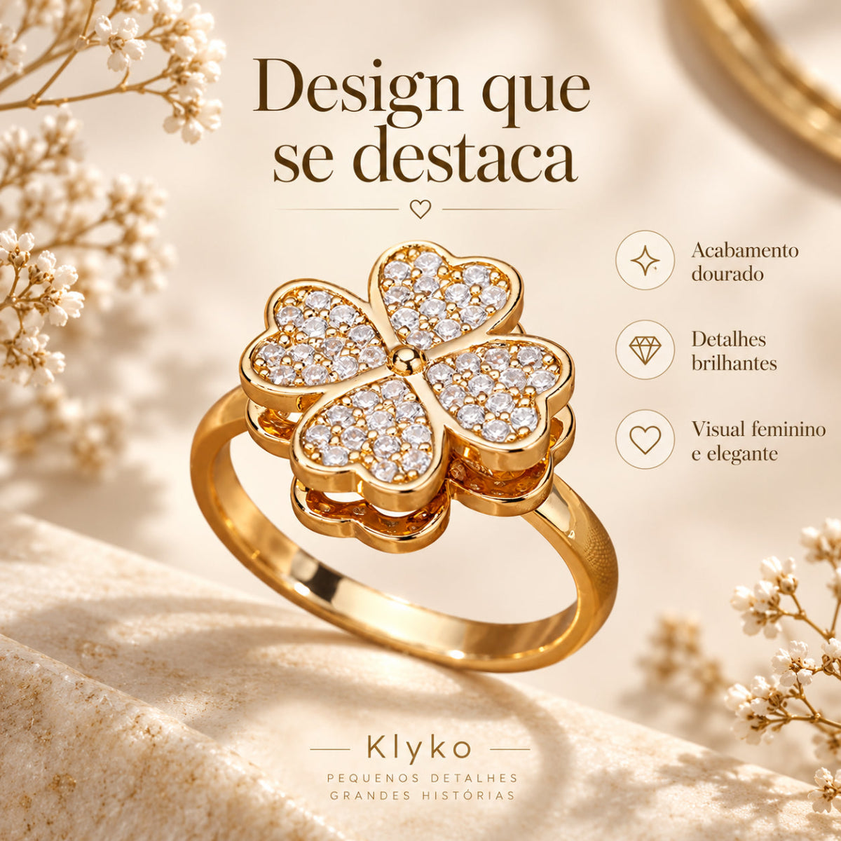 Anel HOPE com design de quatro folhas, acabamento dourado e detalhes brilhantes