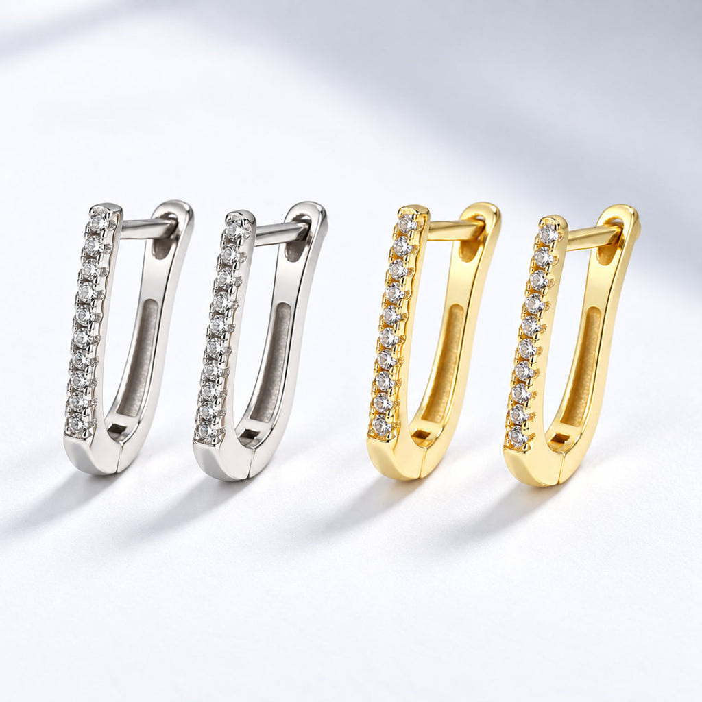 Brincos LUNA em U com zircónias, disponíveis em acabamento prateado e dourado