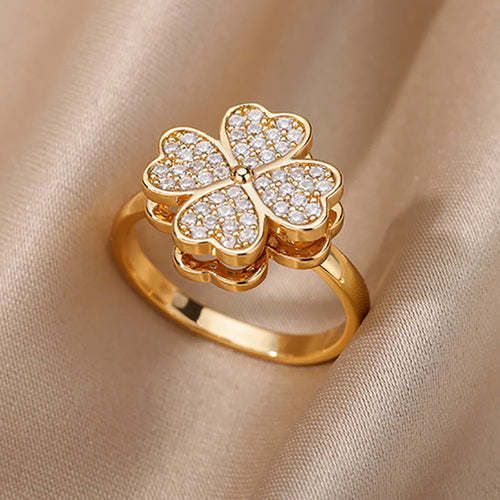 Anel trevo dourado ajustável em aço inoxidável com detalhes brilhantes