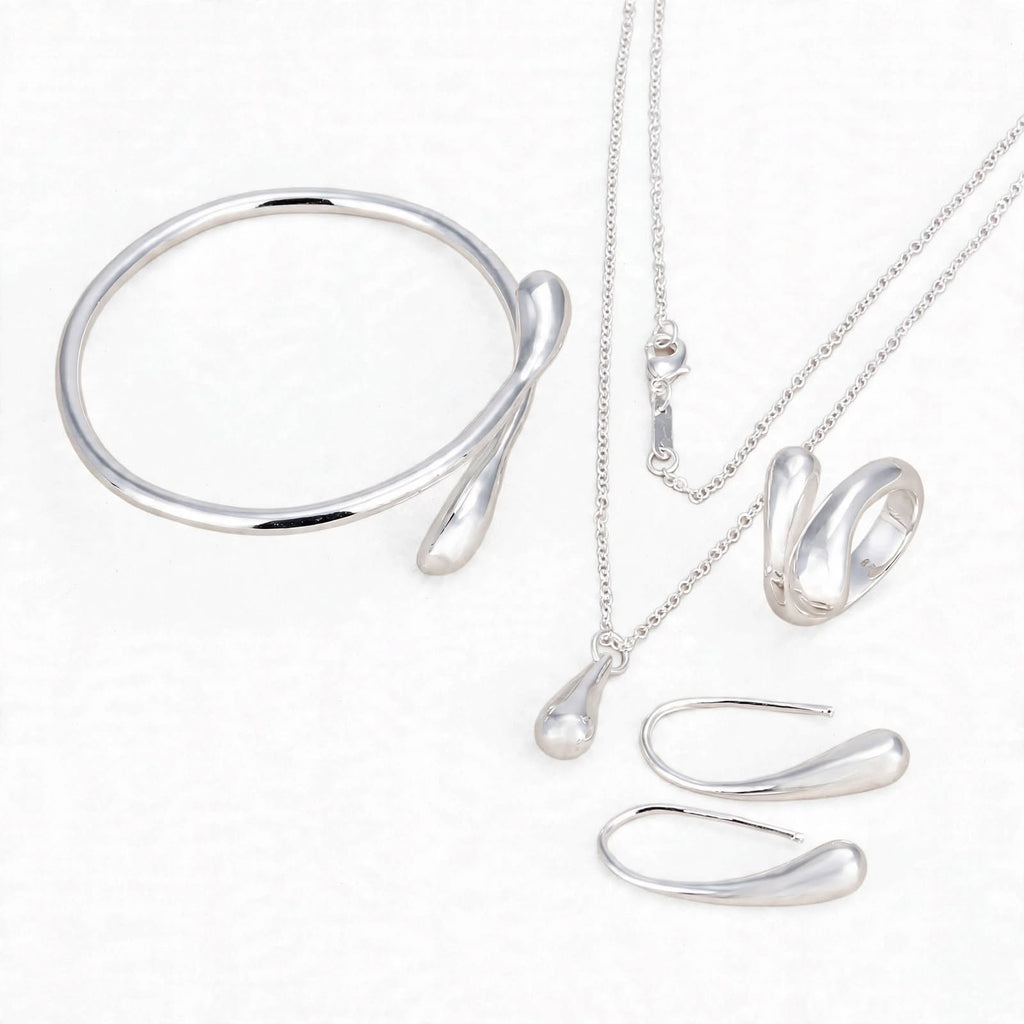 Conjunto NIVA de 4 peças com acabamento prateado e design em gota